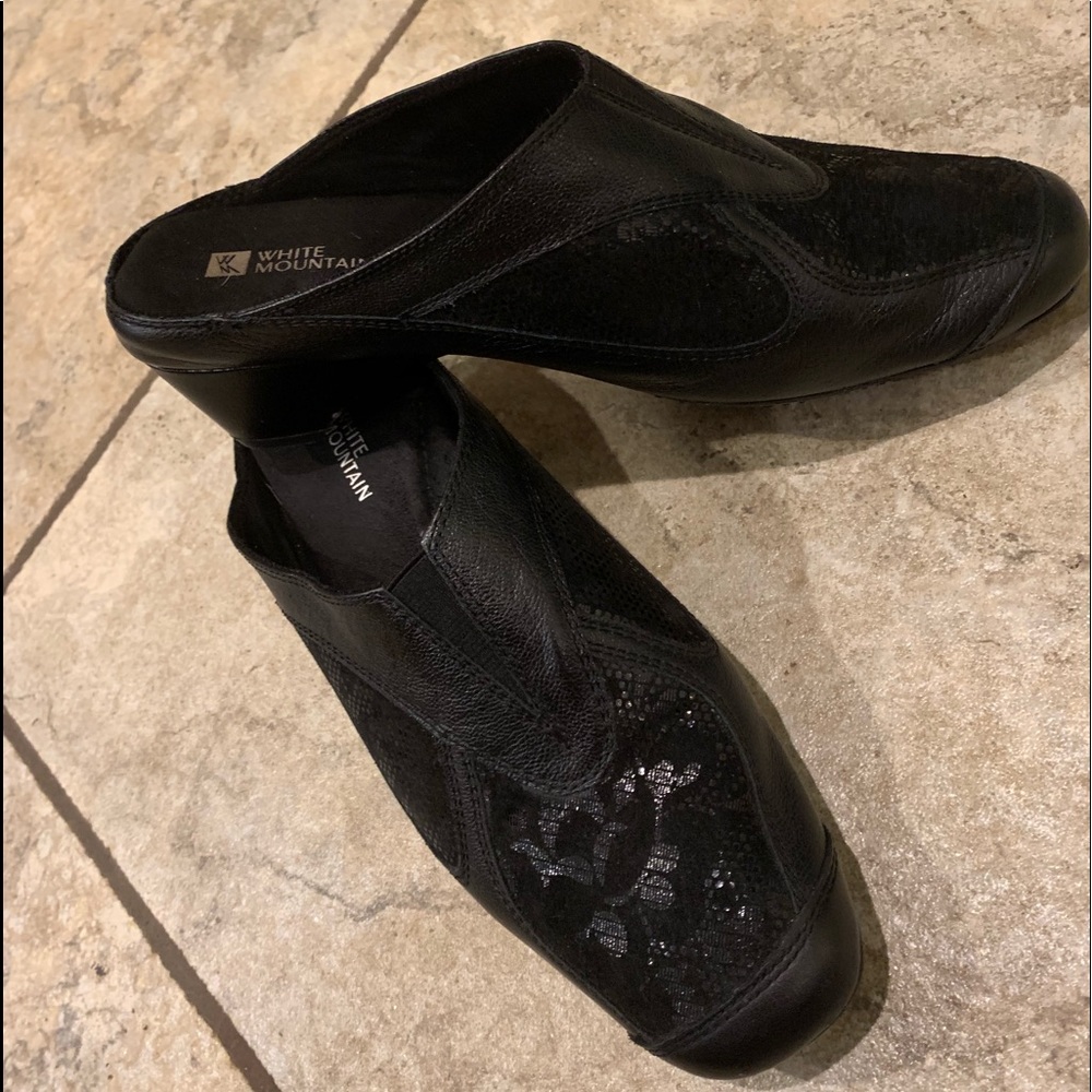Woman’s Black Lacy Mules